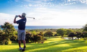 Golf player on Sotogrande golf courses with sea view